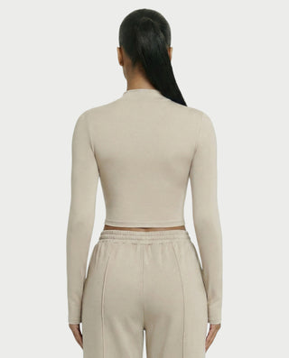 Chaleco corto con hebilla frontal de piel sintética QUELLA