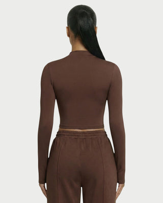 Chaleco corto con hebilla frontal de piel sintética QUELLA