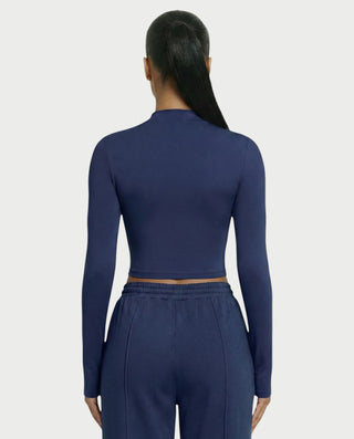 Chaleco corto con hebilla frontal de piel sintética QUELLA