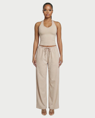 Chaleco corto con hebilla frontal de piel sintética QUELLA