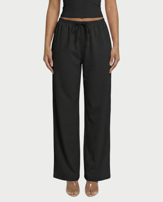 Chaleco corto con hebilla frontal de piel sintética QUELLA