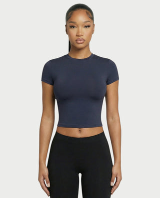 Chaleco corto con hebilla frontal de piel sintética QUELLA