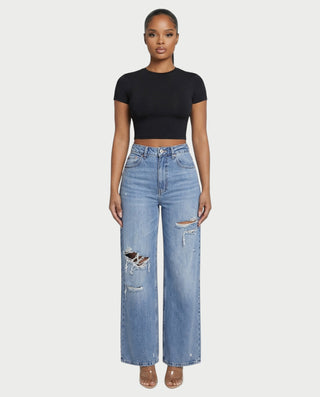 Chaleco corto con hebilla frontal de piel sintética QUELLA