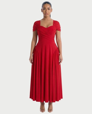 Vestido mini de malla con aberturas y detalle de cadena de JUVIA