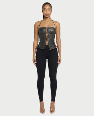 Chaleco corto con hebilla frontal de piel sintética QUELLA