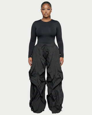 Chaleco corto con hebilla frontal de piel sintética QUELLA