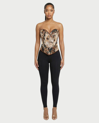 Chaleco corto con hebilla frontal de piel sintética QUELLA