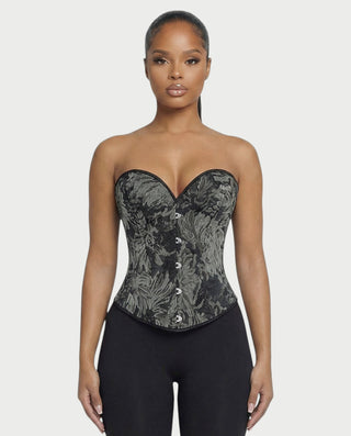 Chaleco corto con hebilla frontal de piel sintética QUELLA