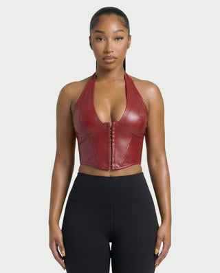 Chaleco corto con hebilla frontal de piel sintética QUELLA