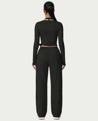 Chaleco corto con hebilla frontal de piel sintética QUELLA