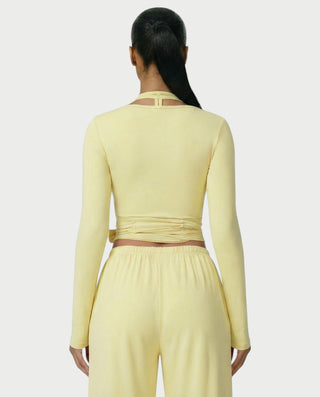 Chaleco corto con hebilla frontal de piel sintética QUELLA