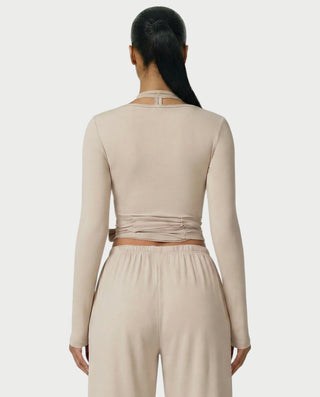 Chaleco corto con hebilla frontal de piel sintética QUELLA