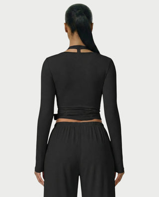 Chaleco corto con hebilla frontal de piel sintética QUELLA