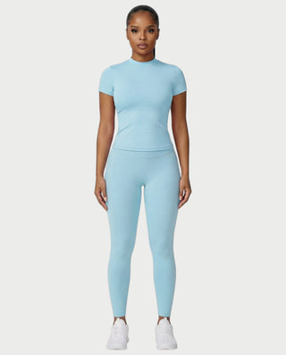 Chaleco corto con hebilla frontal de piel sintética QUELLA