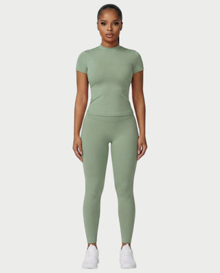 Chaleco corto con hebilla frontal de piel sintética QUELLA