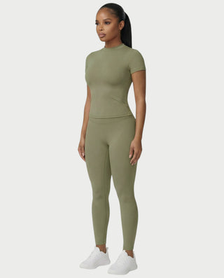 Chaleco corto con hebilla frontal de piel sintética QUELLA