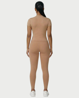 Chaleco corto con hebilla frontal de piel sintética QUELLA