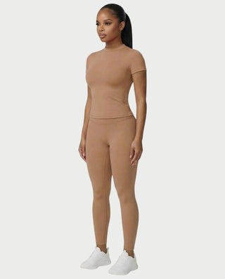 Chaleco corto con hebilla frontal de piel sintética QUELLA