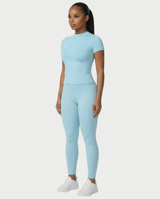 Chaleco corto con hebilla frontal de piel sintética QUELLA