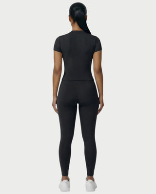 Chaleco corto con hebilla frontal de piel sintética QUELLA